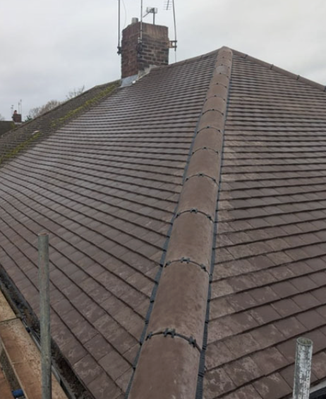 Damaged roof → Repaired roof — after photo of roofing work by Mikey & Sons